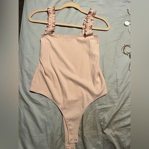 Large pink bodysuit